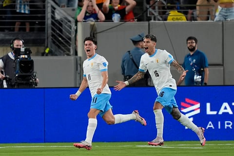 Facundo Pellistri celebrates scoring Uruguay's first goal